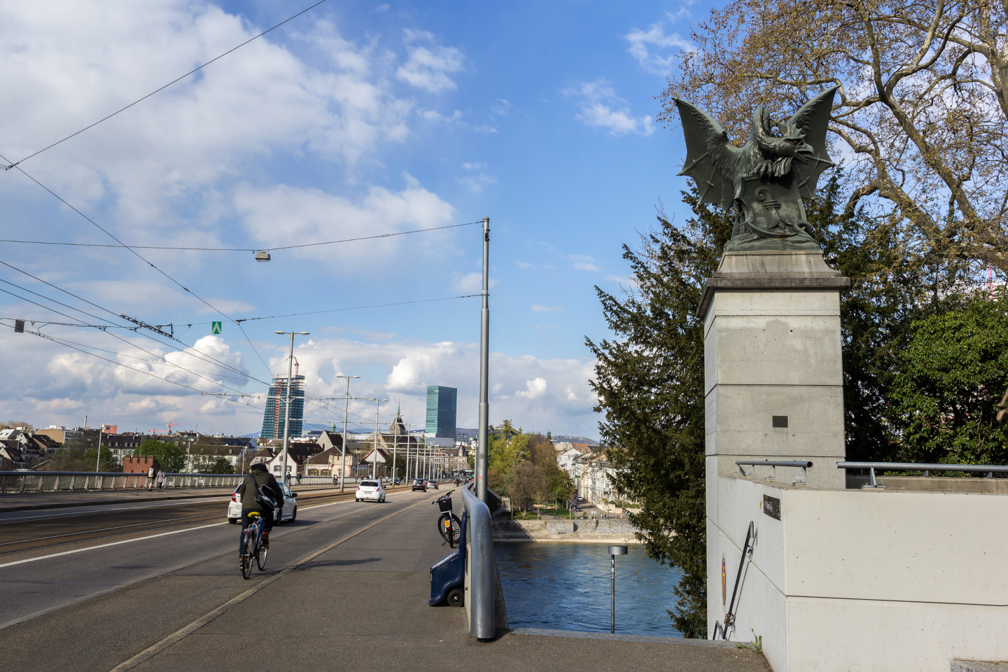 Wettstein Bridge with basilisk bronze figure at one end of the bridge, Basel, Switzerland. iStock 1312686201 4