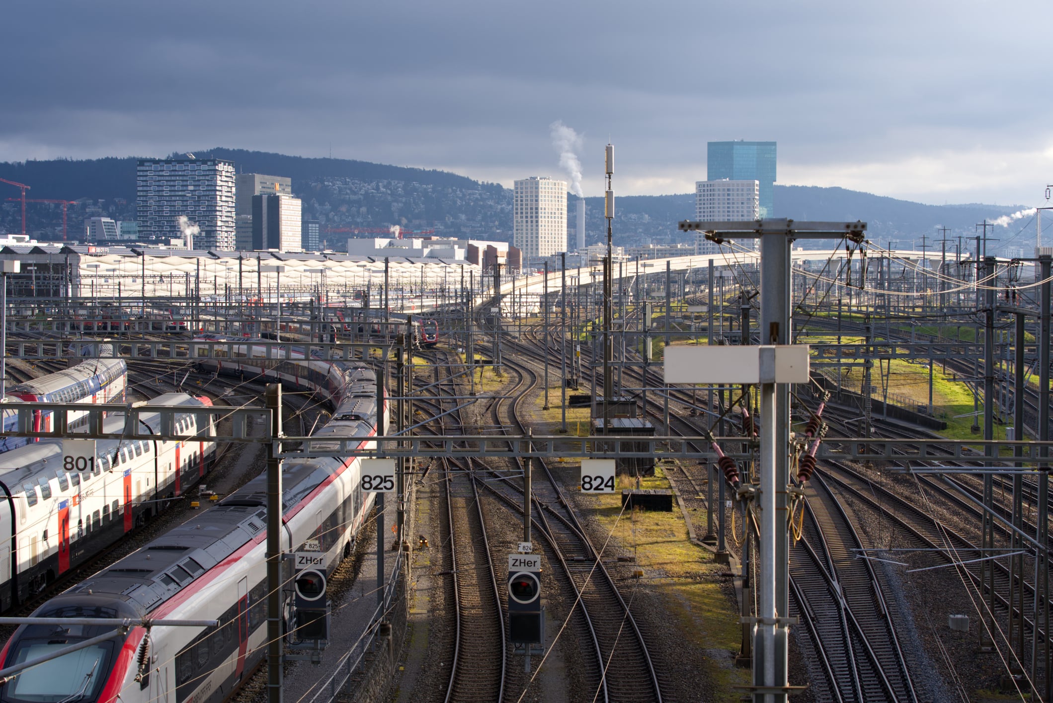 Parked train at Zürich Altstetten with downtown Zürich in the background. iStock 1358108109 3